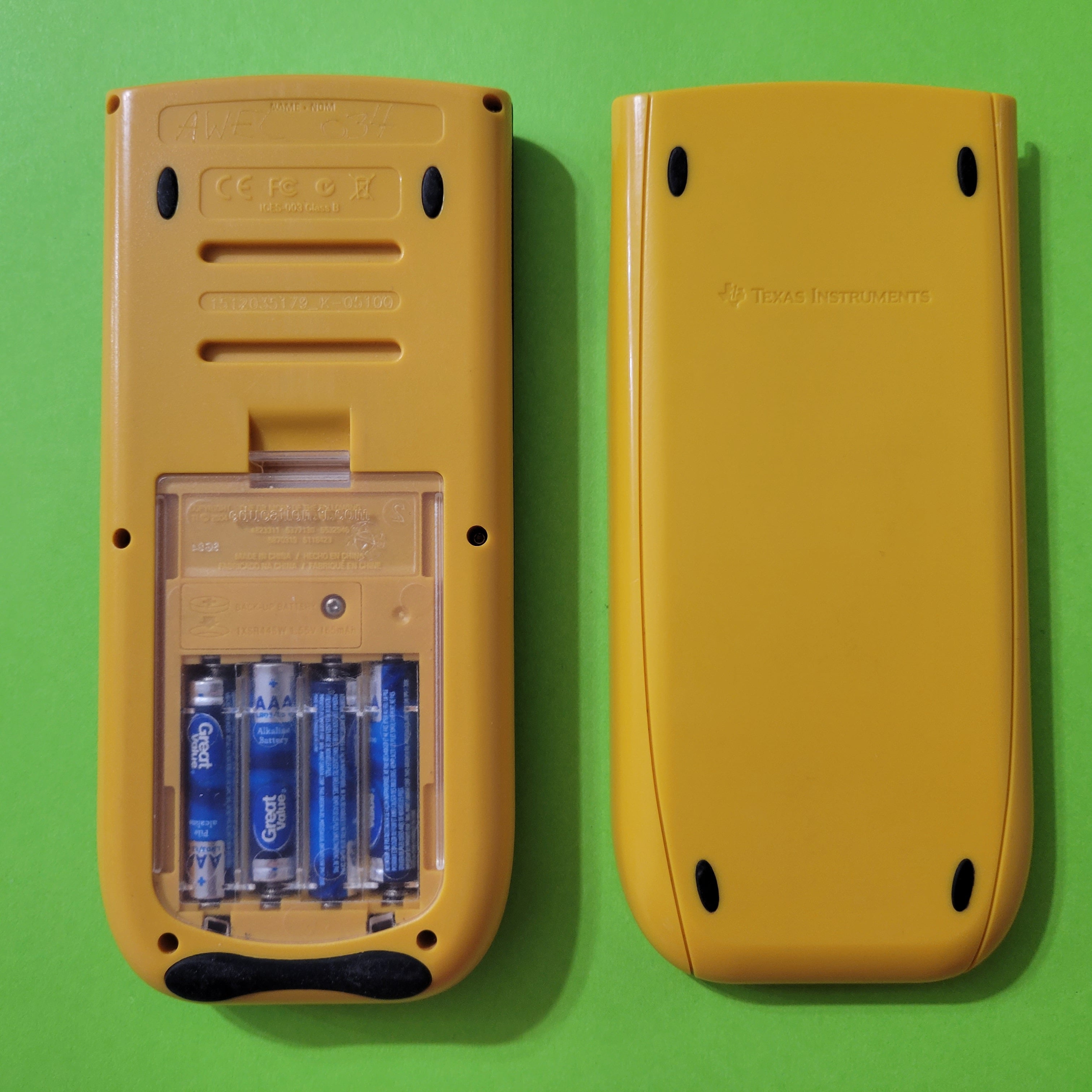 An image of the back of the Texas Instruments TI-84 plus EZ-spot graphing calculator and its slide case